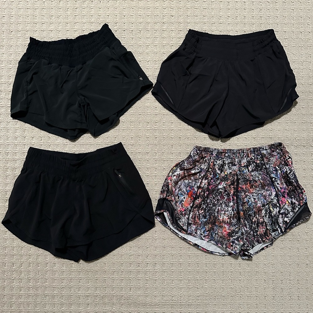 4 pairs of Lululemon shorts. Excellent used condition.